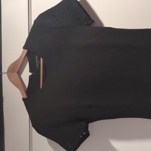 Short sleeve, black mini dress with edge detailing